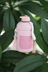 Drink bottle with straw lid and storage sleeve