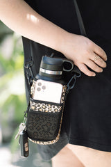 Insulated stainless steel drink bottle with straw lid and storage sleeve in leopard print or black