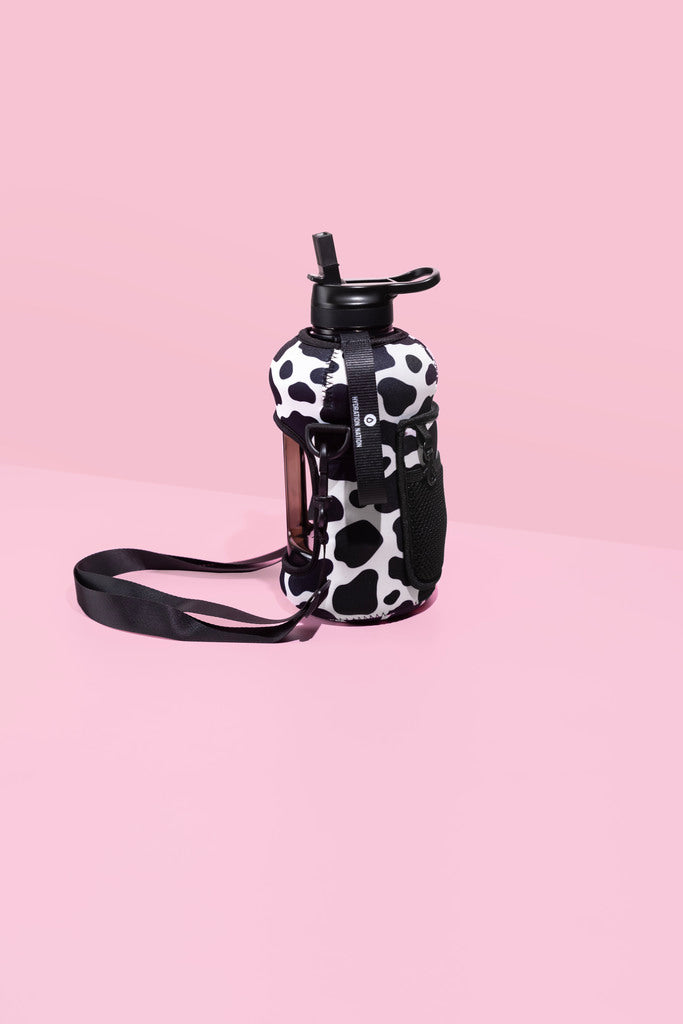 drink bottle with straw lid and storage sleeve