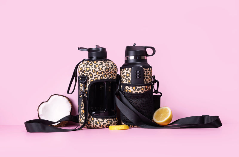leopard print drink bottle with straw lid and storage sleeve